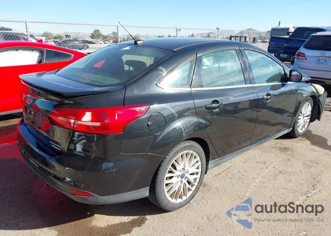 2015 Ford Focus Titanium from USA, damaged, VIN 1FADP3J29FL214819